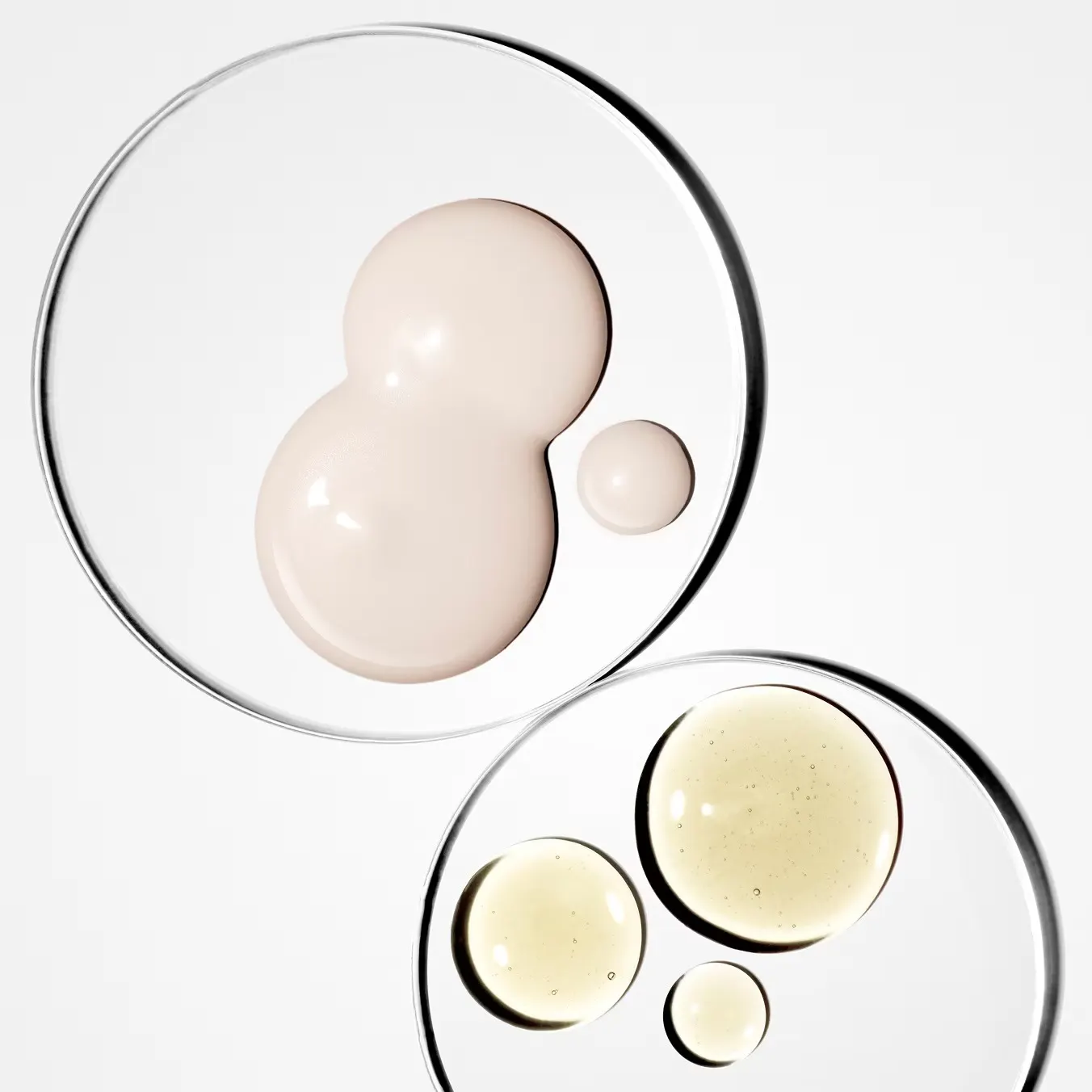 Cream and oil swatches on glass
